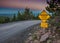 Narrow Steep Road Sign at Sunset