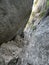 Narrow and stony passage between two imposing rock walls in the Luberon in Provence