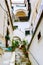 Narrow street with ancient stairs in the Amalfi town, southern Italy