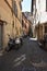 Narrow street  with cobblestones in Rome