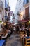 Narrow street crowded in Peniscola, Spain