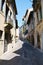 Narrow street and decayed walls in Asolo, Italy