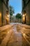 Narrow street entrance to Plaza Real in Barcelona, Catalonia, Spain