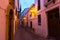 Narrow street in european city. Ronda