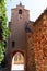 Narrow street in French village of Roussillon buildings colorful ochre in France