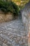 A narrow street of italy with steps of stone. Monselice, Italy.