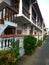 Narrow street with long, covered with long balconies