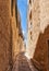 The narrow street of Mdina, the old capital of Malta.