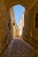 The narrow street of Mdina, the old capital of Malta.