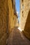 The narrow street of Mdina, the old capital of Malta.