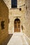 The narrow street of Mdina, the old capital of Malta.