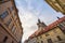 Narrow street with medieval buildings and cobblestones in the old town of Prague Czech Republic, also called Stare mesto.