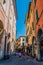 Narrow Street with old buldings in Pisa, Italy