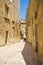 The narrow street of the old capital Vittoriosa Birgu, Malta