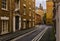 Narrow street in the old style, with brick buildings, historical