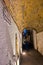 Narrow street passage at Carloforte harbor, San Pietro island, Sardinia