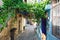 Narrow street on Rhodes island with traditional Greek houses