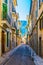 a narrow street in the spanish town Soller at Mallorca