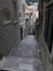 Narrow street with stone pavement