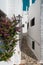 Narrow street in the traditional fishing village of Binibeca on the coast of Menorca, Spain.