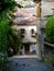 Narrow street with traditional houses in Volosko village in Croatia