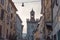 Narrow street with upper facad of Torre della Pallata, Brescia Old Town, Lombardy, Italy