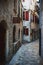 Narrow streets of the ancient city-fortress of the Mediterranean. Travel to Montenegro, Kotor.