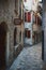 Narrow streets of the ancient city-fortress of the Mediterranean. Travel to Montenegro, Kotor.