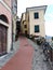 narrow streets and the colorful buildings of Italy