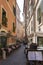 Narrow streets with cozy terraces like here in Via della Paste, Rome, Italy