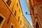 Narrow streets with old mediaval residential buildings in Rome, Italy