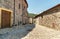 Narrow streets with stone houses in the small mountain village of Bassola, hamlet of Armeno, province of Novara, Piedmont, Italy