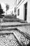 Narrow streets with stone staircase in Ferragudo town