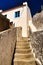 Narrow streets and white houses of Azenhas do Mar in Portugal