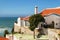 Narrow streets and white houses of Azenhas do Mar in Portugal