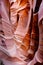 Narrow striped slot canyon walls.