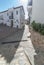 Narrow sunny street of Comares, Malaga, Spain