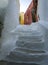 Narrow tourist street with white steps in the Cycladic style in the Athens district of Anafiotika