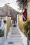 Narrow tourist street with white steps in the Cycladic style in the Athens district of Anafiotika