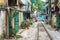 Narrow train railroad in old town in Hanoi