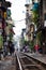 Narrow train street in Hanoi