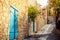 Narrow uphill cobbled street at Lofou village. Limassol District