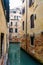 Narrow Venetian canal - Venice, Italy