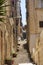 Narrow walking street in old town of Valletta, Malta.