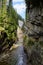 Narrow web on the edge of the breitach gorge