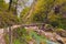 Narrow and winding path with the bridge over Tolmin Gorge Tolminska Korita.