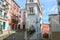 Narrow winding street in in the Alfama, Lisbon, Portugal