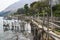 Narrow wooden bridge and docks along lake Atitlan at the coast of Santa Cruz la Laguna, Guatemala