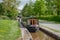 Narrowboat approaches a lock