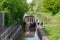 Narrowboat approaches a lock